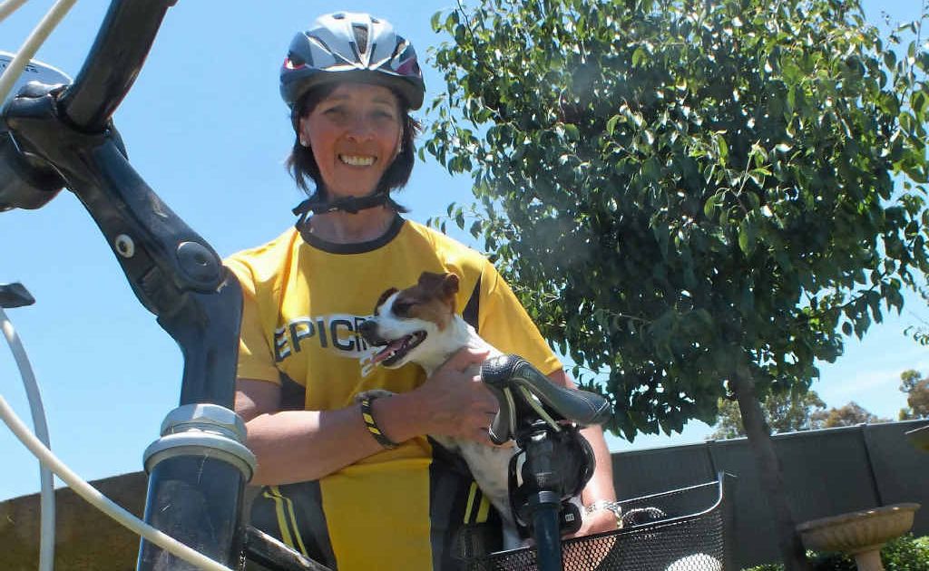 Leanne Cameron – with her training buddy Millie – is preparing to tackle a 200km bike ride to raise money for cancer research. Leanne Cameron – with her training buddy Millie – is preparing to tackle a 200km bike ride to raise money for cancer research.